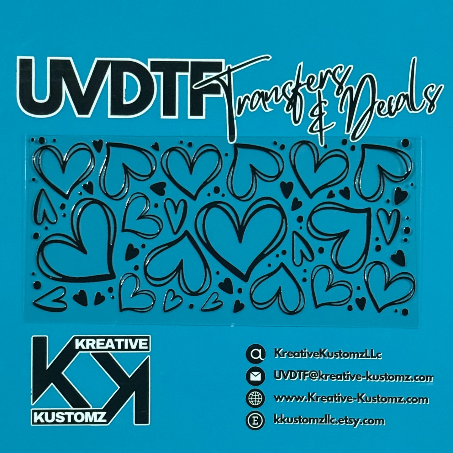 A black heart pattern UV DTF adhesive wrap for a 16oz glass can on a blue background.