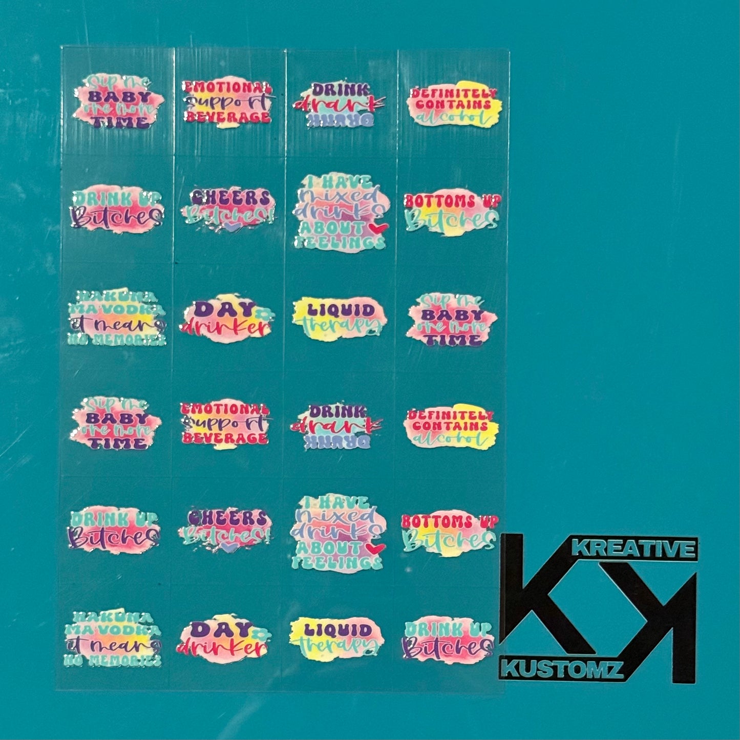 An A5 sheet containing 24 precut UV DTF decals featuring various colorful drinking-themed quotes.