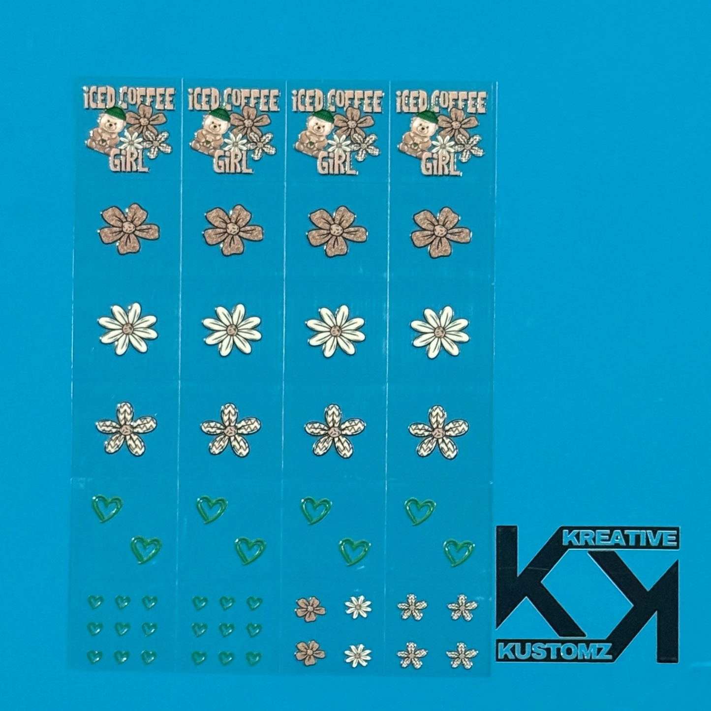An A5 sheet of 24 precut UV DTF decals featuring iced coffee bears, flowers, and green hearts.