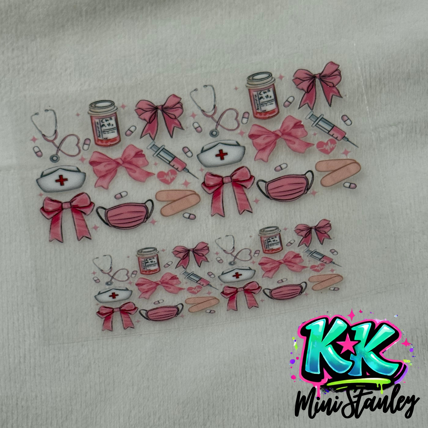 Two sheets of nursing-themed UV DTF decals featuring pink bows, stethoscopes, and medical icons.