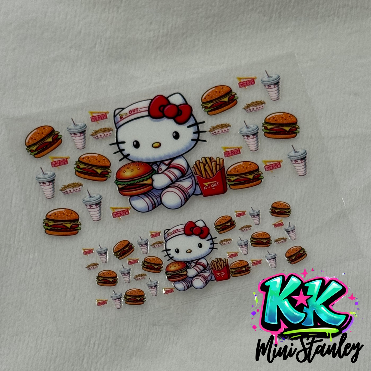 Two UV DTF adhesive decals featuring Hello Kitty with In-N-Out burgers and fries.
