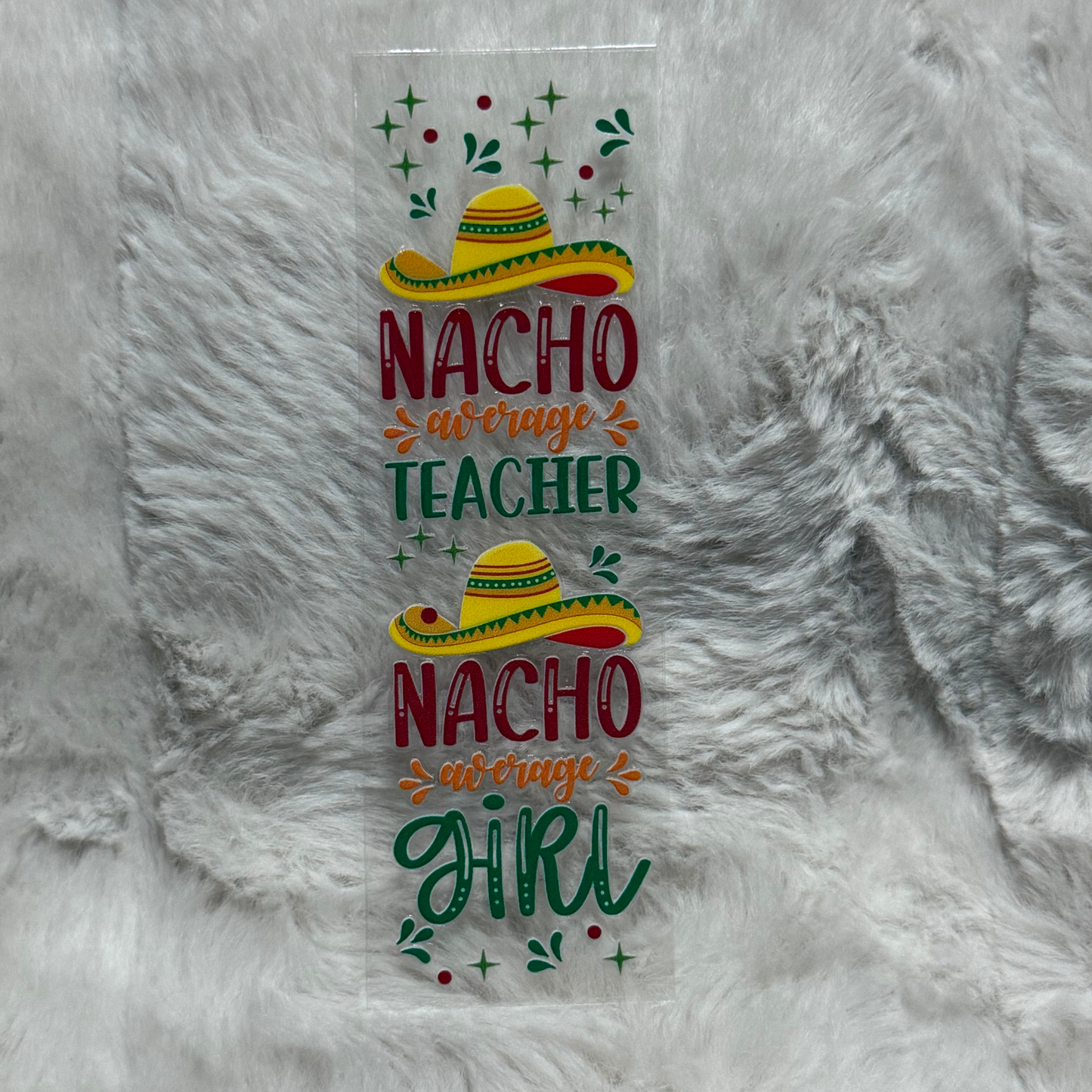 A rectangular UV DTF pen wrap featuring two sombreros and the text Nacho Average Teacher and Girl.