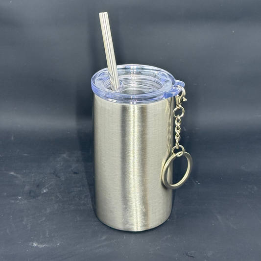 A 3oz stainless steel mini skinny tumbler with a clear lid, metal straw, and attached keychain.
