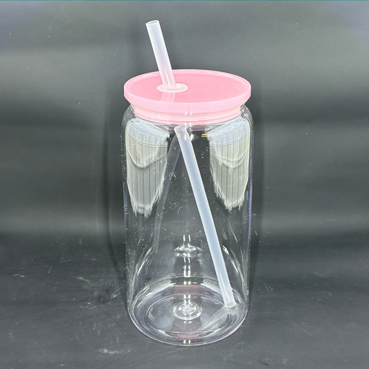 A clear 16oz acrylic beer can tumbler with a light pink lid and a matching straw.