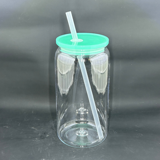 A clear 16oz acrylic beer can tumbler with a green lid and a matching straw.