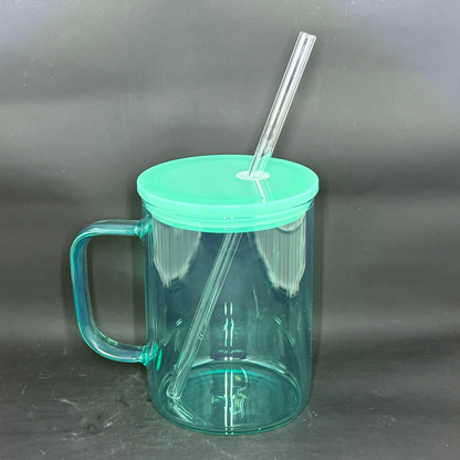 A translucent teal glass mug with a matching lid and straw against a dark background.