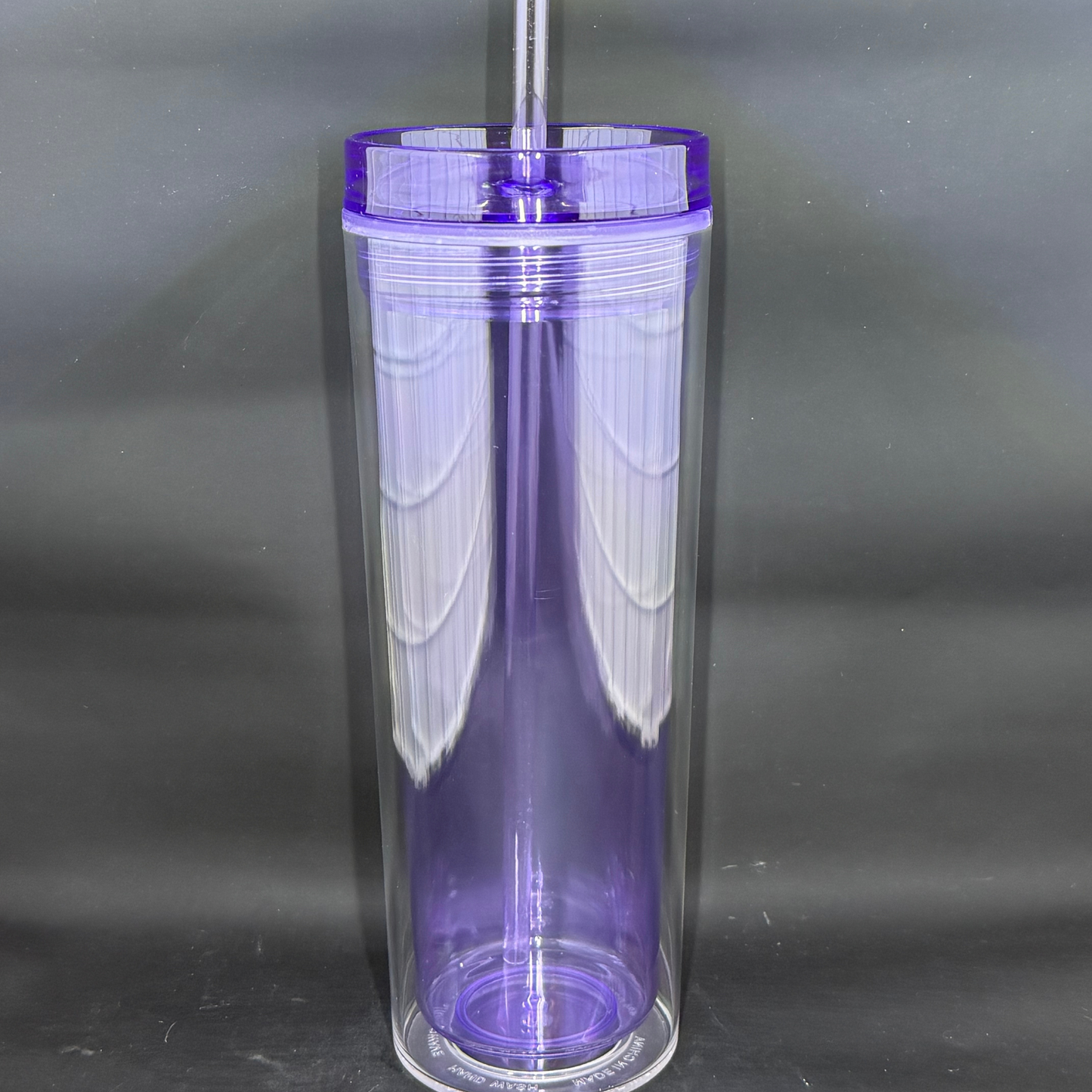A 16oz light purple skinny acrylic tumbler with a clear lid and matching straw.