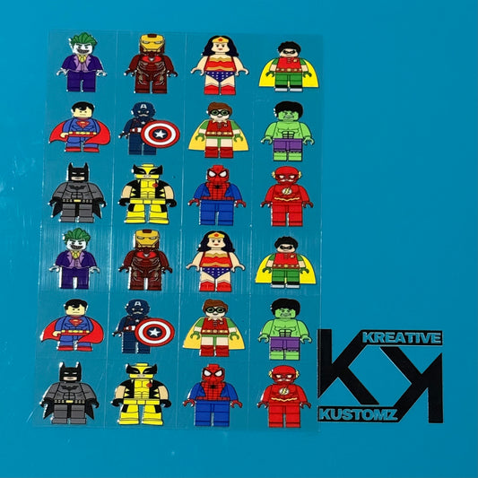 An A5 sheet of 24 precut UV DTF decals featuring various superhero and villain minifigure designs.