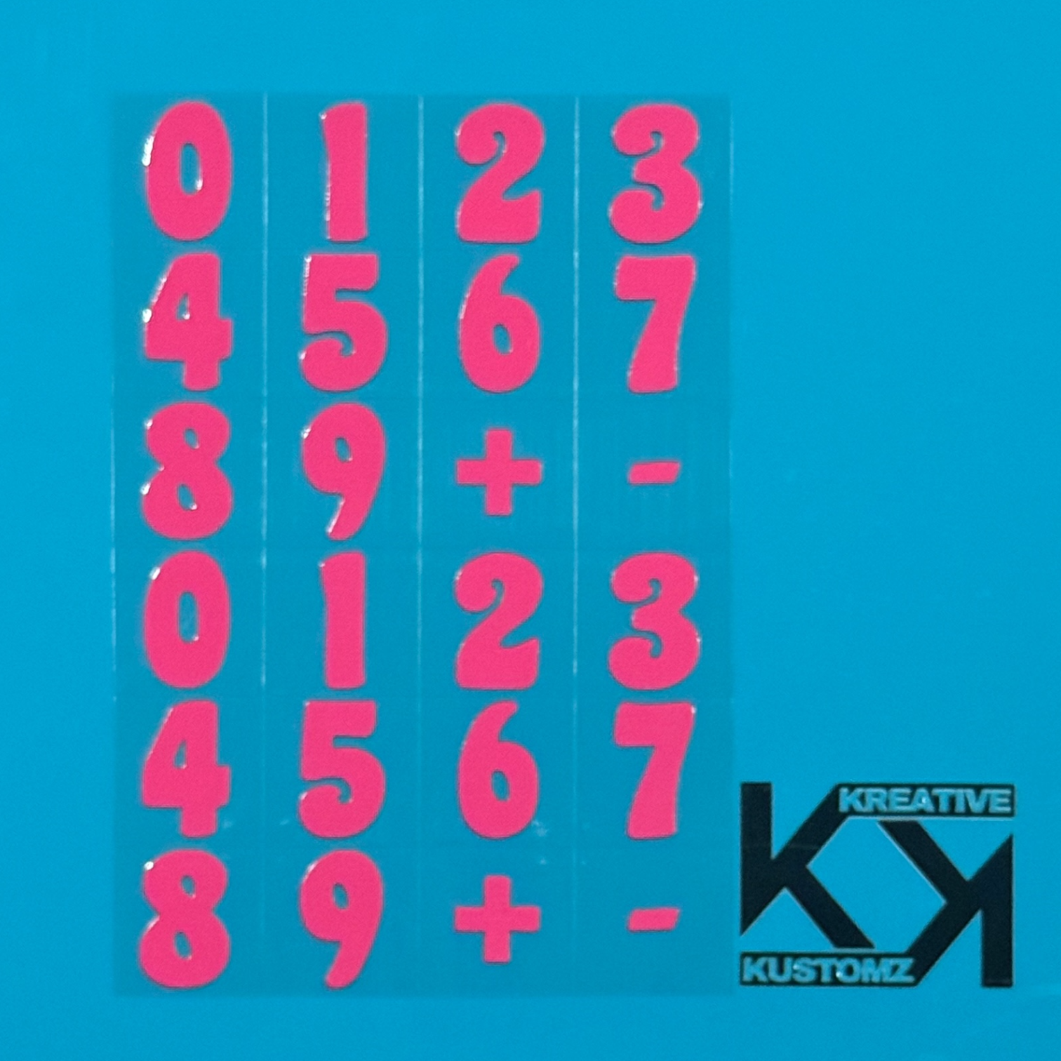 An A5 sheet of pink precut number and symbol decals for glassware application.