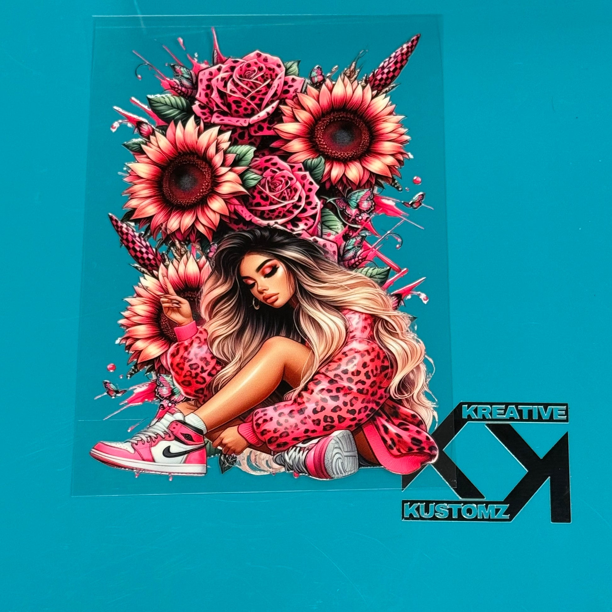 A UV-DTF decal featuring a woman in a pink leopard print outfit and sneakers surrounded by flowers.