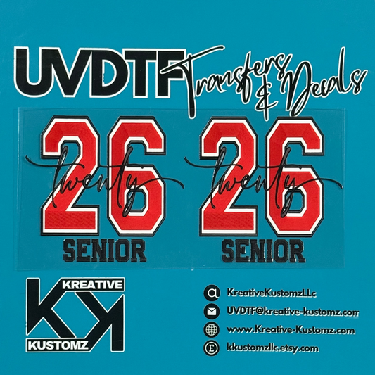 Two red and black 26 senior cup decals with cursive text on a clear adhesive sheet.