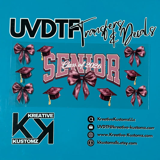 A maroon and white Senior Class of 2026 UV DTF cup wrap with bow and graduation cap accents.