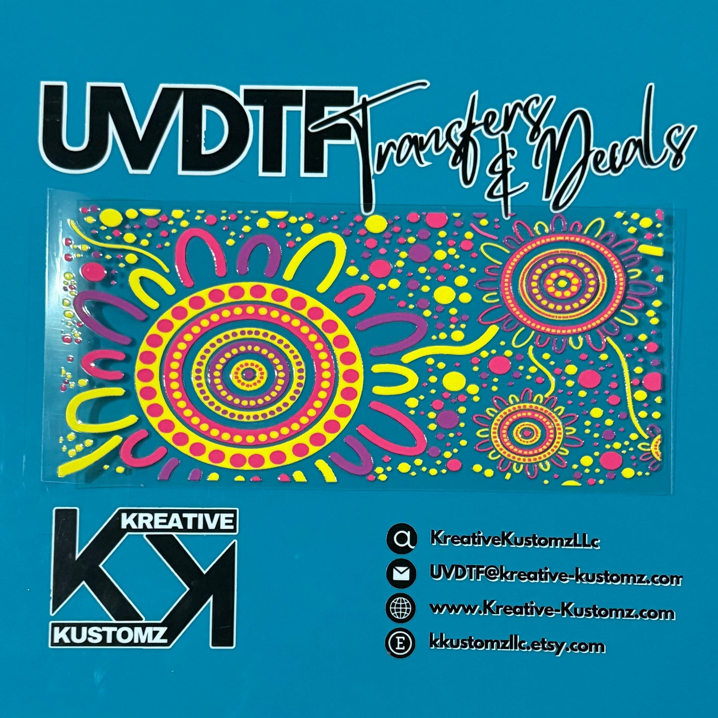 A colorful floral UV DTF adhesive wrap for a 16oz glass cup on a blue background.