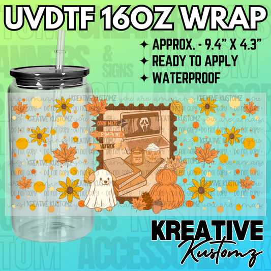 A Halloween themed UV DTF adhesive wrap for a 16oz glass cup featuring autumn and spooky designs.