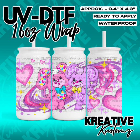 A UV DTF adhesive wrap for a 16oz glass cup featuring two cartoon bunnies and hearts.