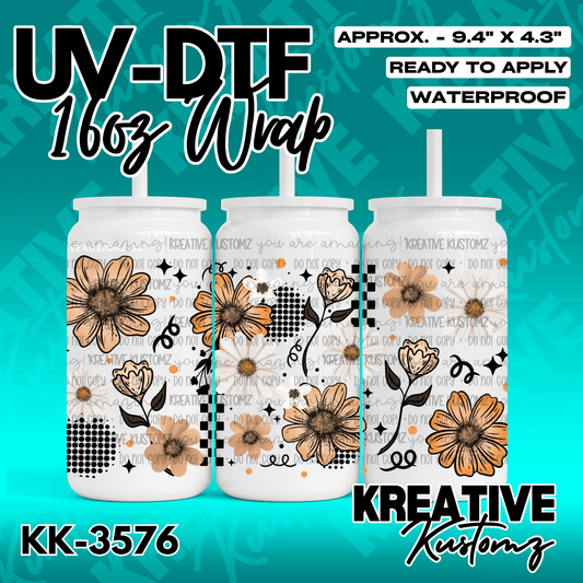 A floral UV DTF adhesive wrap for a 16oz glass can featuring orange flowers and black patterns.