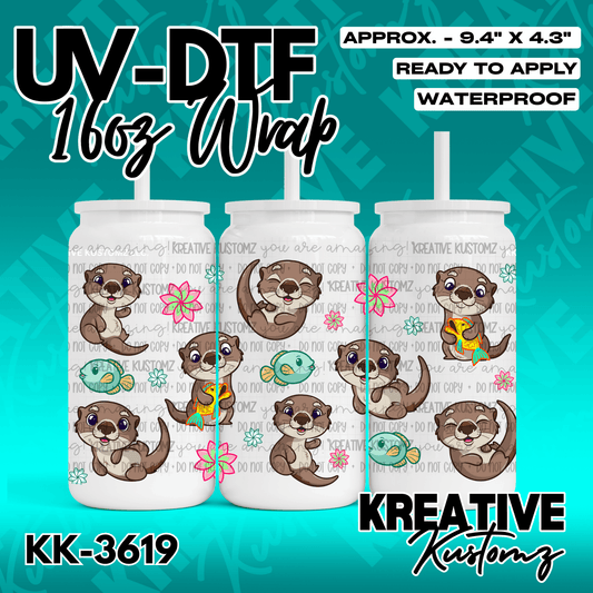 A UV DTF adhesive wrap for a 16oz glass cup featuring a pattern of cute otters, fish, and flowers.