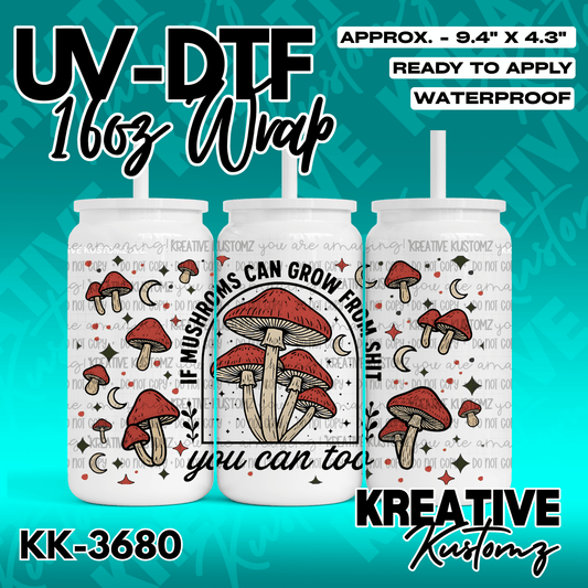 A UV DTF cup wrap featuring red mushrooms, crescent moons, and the text if mushrooms can grow from shit you can too.