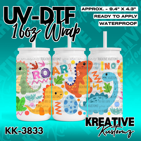 A colorful dinosaur themed adhesive wrap for a 16 ounce glass can cup.