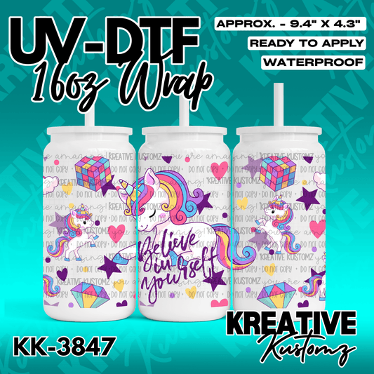 A UV DTF cup wrap featuring a unicorn, colorful geometric shapes, and the text Believe in yourself.