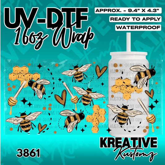 A bee and honeycomb themed adhesive wrap for a 16oz glass cup.