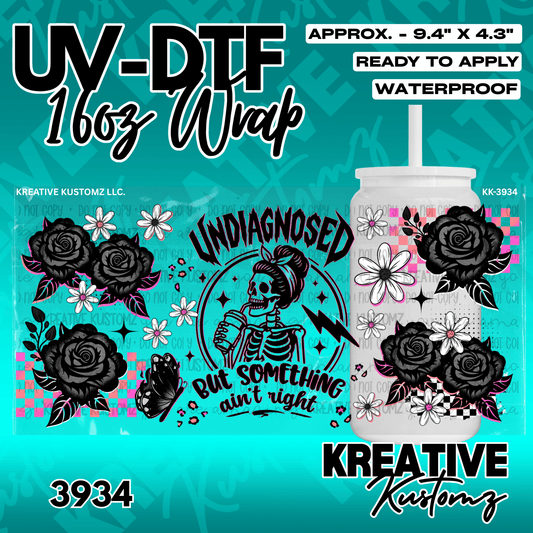 A UV DTF adhesive wrap for 16oz glass cans featuring a skeleton design with roses and flowers.