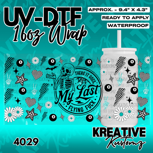 A teal and black adhesive cup wrap featuring a skeleton, flowers, and checkered patterns.
