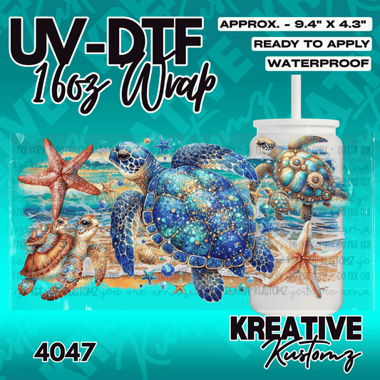 A UV DTF adhesive wrap featuring sea turtles and starfish on a beach scene for a glass cup.