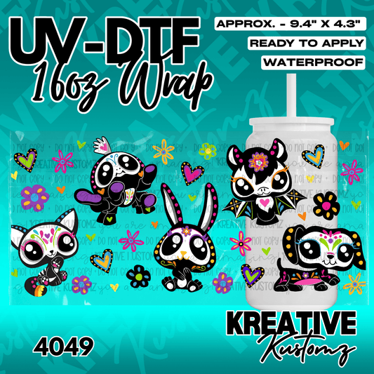 A UV DTF adhesive wrap featuring colorful sugar skull style animals for a 16oz glass cup.