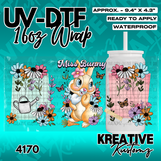 A floral UV DTF adhesive wrap featuring a cartoon bunny and garden elements for a glass cup.