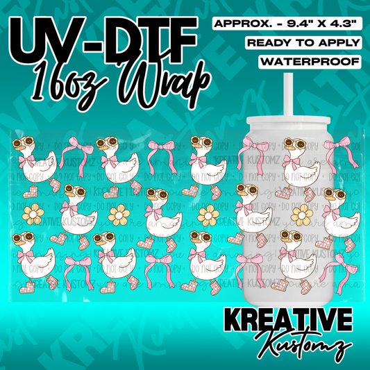 A UV DTF cup wrap featuring a pattern of ducks wearing sunglasses and pink bows.