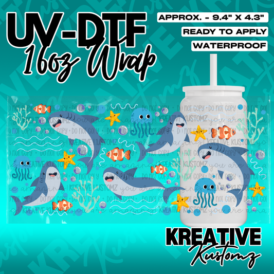 A 16oz glass can wrap featuring a colorful underwater pattern with sharks, fish, and jellyfish.