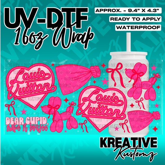 A pink and red Louis Vuitton themed UV DTF adhesive wrap for a 16oz glass cup.