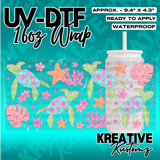 A floral UV DTF adhesive wrap for 16oz glass cans featuring sea turtles and coral designs.