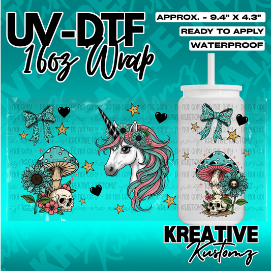A UV DTF cup wrap featuring a unicorn, mushrooms, skulls, and floral designs for a 16oz glass can.