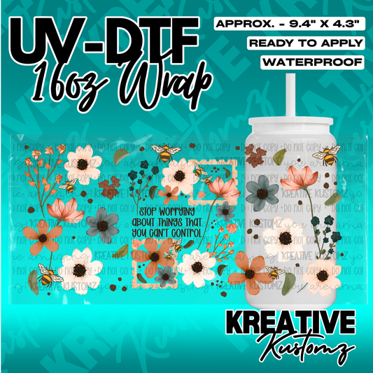 A floral and bee themed adhesive cup wrap for a 16oz glass can.
