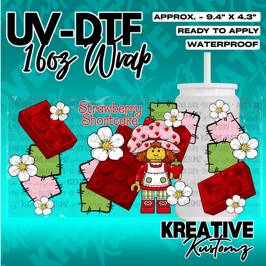 A Strawberry Shortcake themed UV DTF adhesive wrap for a 16oz glass cup.