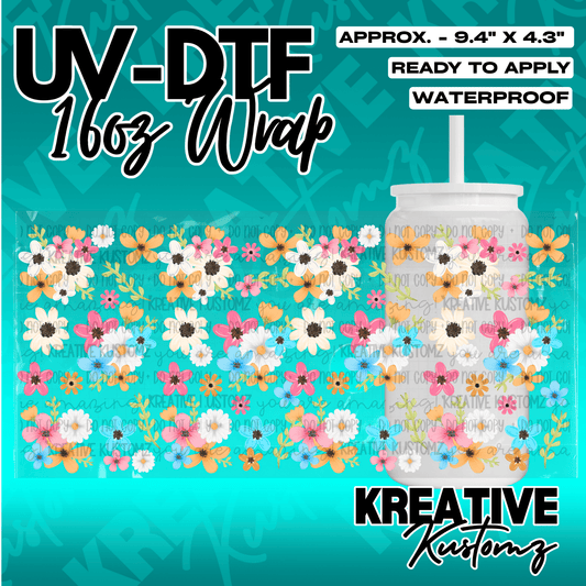A floral UV DTF wrap for a 16oz glass can featuring colorful flowers and inspirational text.