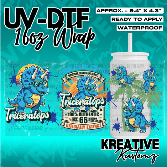 A UV DTF adhesive wrap for 16oz glass cups featuring a blue cartoon triceratops dinosaur design.