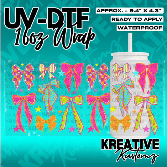 A UV DTF adhesive cup wrap featuring a colorful pattern of bows for 16oz glass cans.
