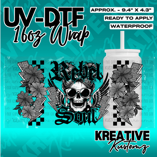 A UV DTF adhesive wrap for 16oz glass cans featuring a skull with wings and floral accents.