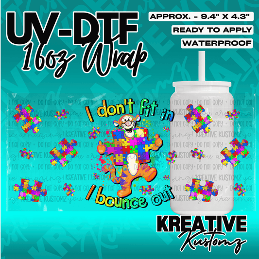 A Tigger-themed UV DTF cup wrap featuring puzzle pieces and the text I don't fit in I bounce out.
