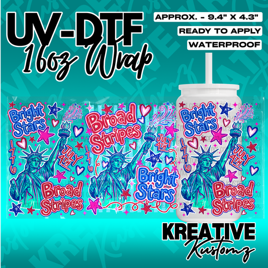 A patriotic Statue of Liberty UV DTF adhesive wrap for a 16oz glass cup.