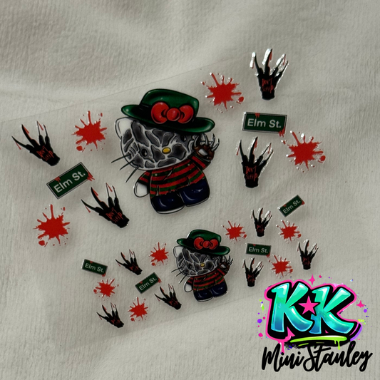 A UV DTF adhesive wrap featuring Hello Kitty dressed as Freddy Krueger with horror-themed decals.