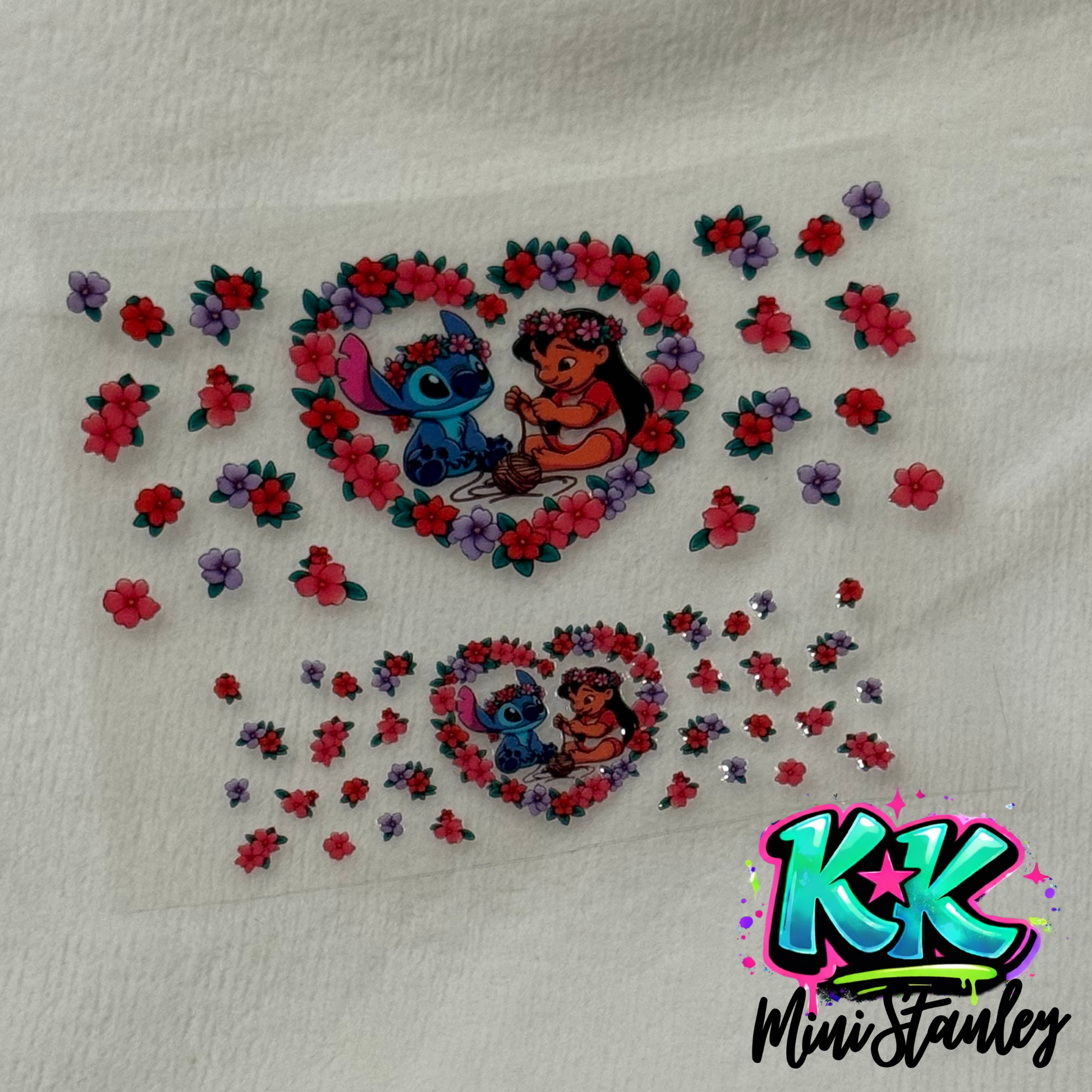 Two Lilo and Stitch themed UV DTF adhesive decals with floral heart designs on a clear sheet.
