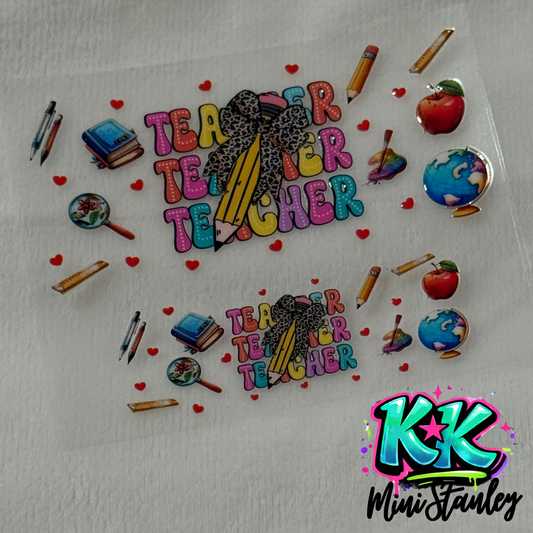 Two teacher-themed UV DTF adhesive decals featuring pencils, books, and globes on a clear sheet.