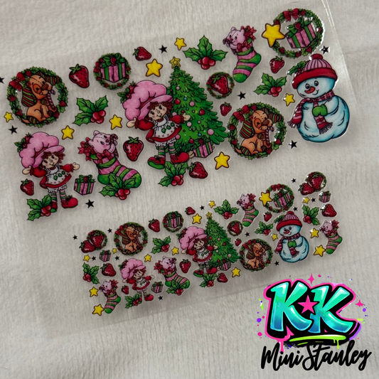 Two sheets of Strawberry Shortcake themed UV DTF adhesive decals for mini keychains.