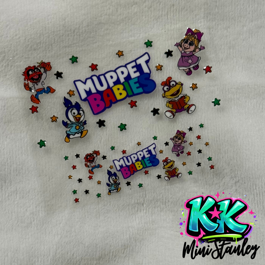 Two Muppet Babies UV DTF adhesive transfers featuring characters and stars on a white background.