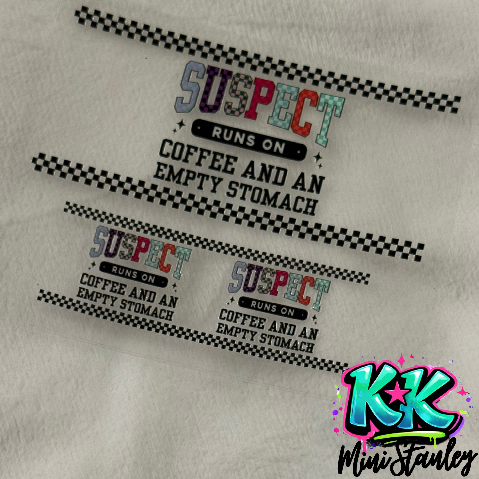 Three UV DTF adhesive decals featuring the text Suspect runs on coffee and an empty stomach.
