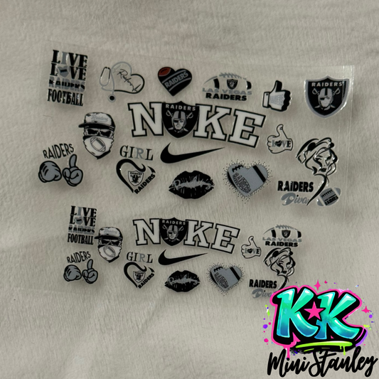 Two sheets of Las Vegas Raiders themed UV DTF adhesive transfers for mini keychain cups.